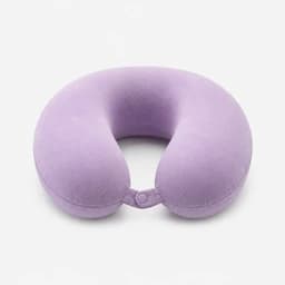 Muted-lavender U-shaped travel pillow.